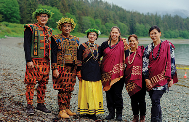 a group of people wearing traditional clothing