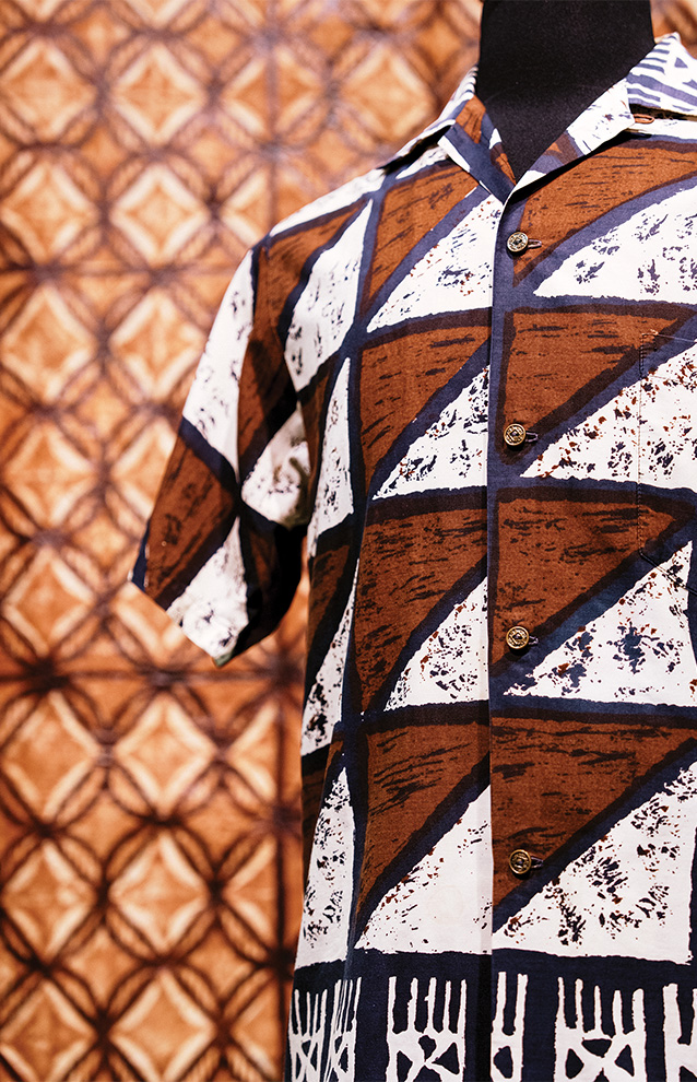 a closeup of a shirt with a complex pattern in shades of brown