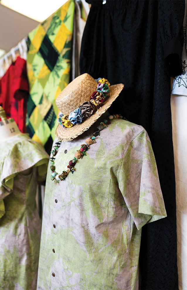 a shirt and a hat on a headless mannequin