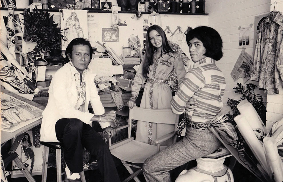an old photograph of three people