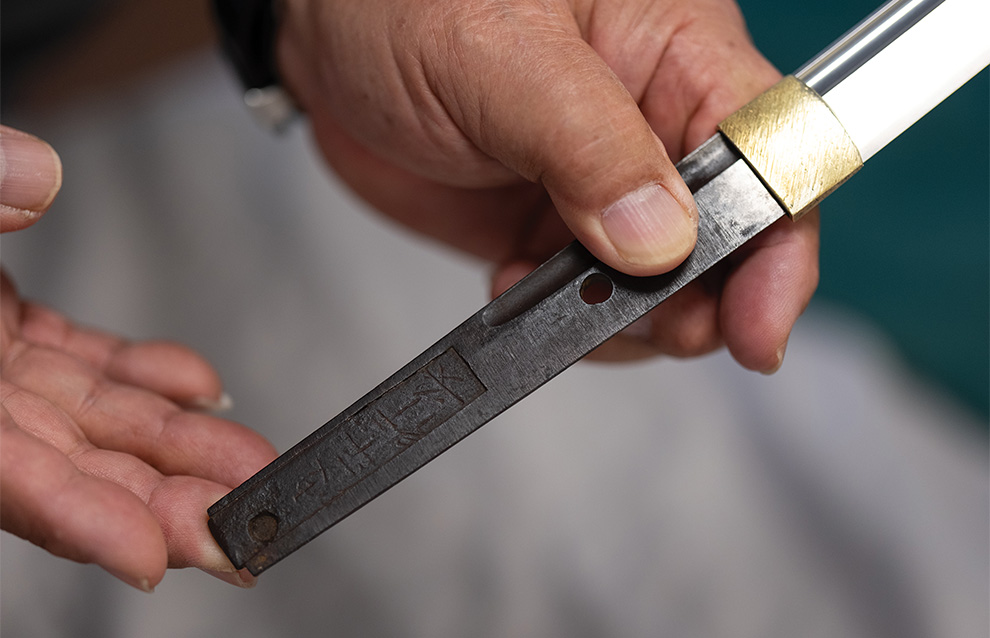 a closeup of a person holding a knife